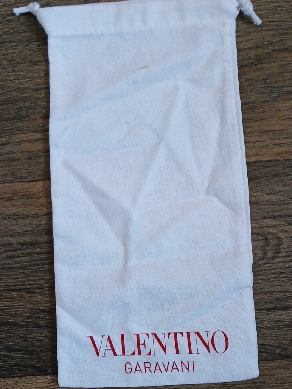 Valentino Garavani White Drawstring Dust Bag.